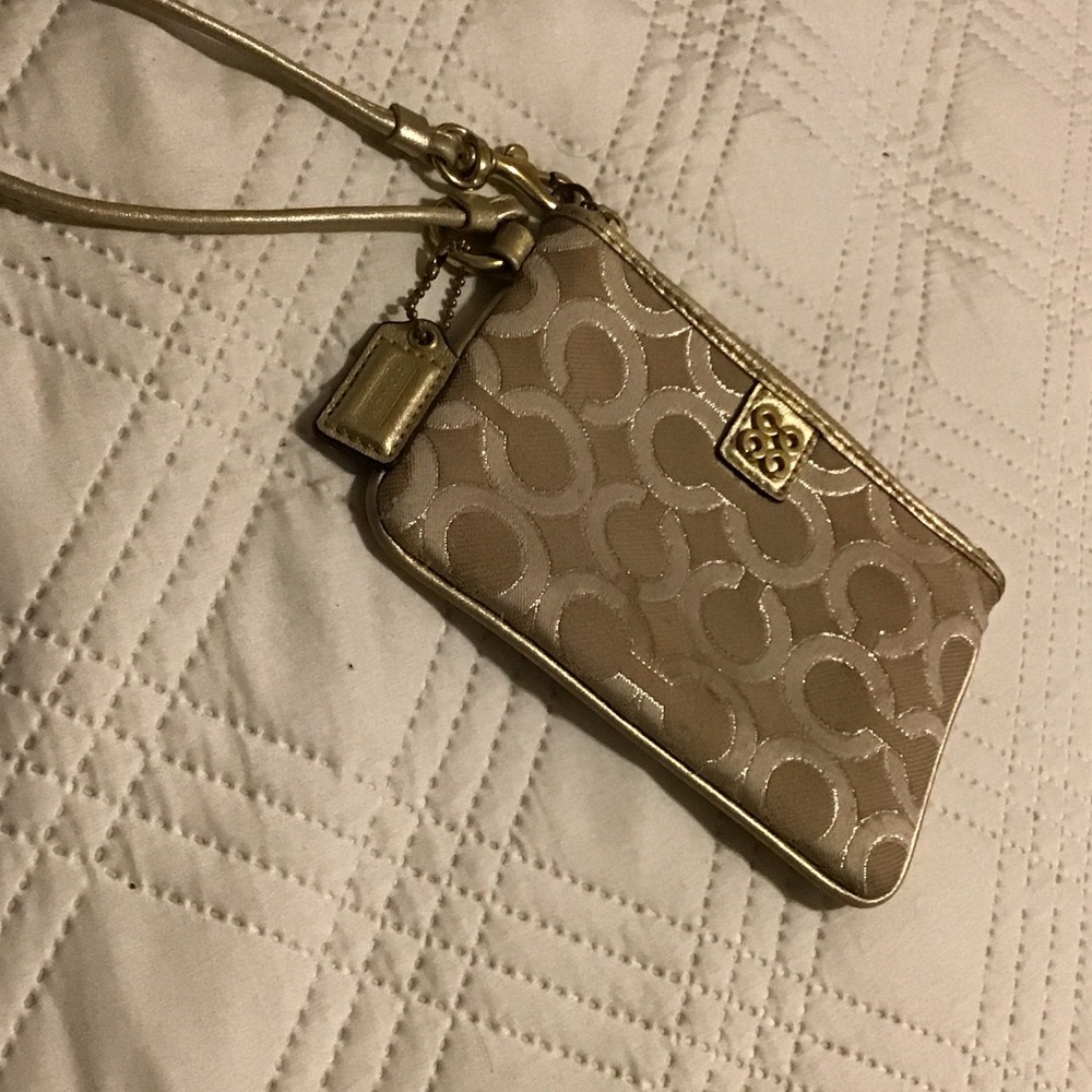 Coach Gold Wristlet with Signature Pattern